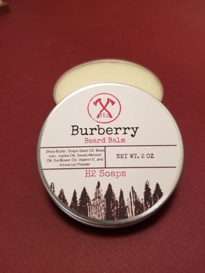 Handcrafted beard balm in Burberry scent.  Style while softening and moisturizing your beard.  Improves beard health and last all day while smelling good.  Acts as both a leave-in-beard conditioner and a shaping/styling aid.  A little goes a long way.  Ingredients:  Shea Butter, Grapeseed Oil, Bees Wax, Jojoba Oil, Sweet Almond Oil, Sunflower Oil, Vitamin E, and Arrowroot Powder.  **Not edible.  Do not consume.  For external use only.  Keep out of eyes and mouth.  Discontinue use if irritation occurs.